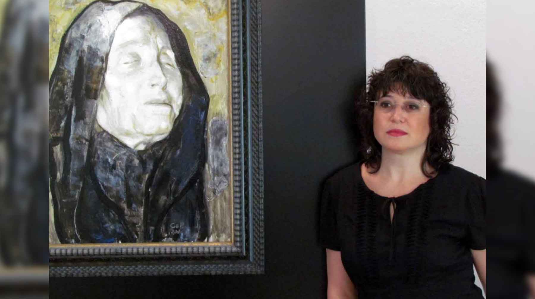 Жени Костадинова у портрета Ванги в Рупите.